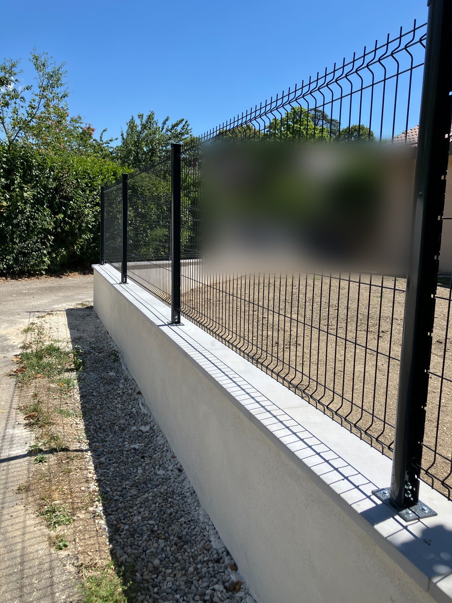 Muret et clôture terminés